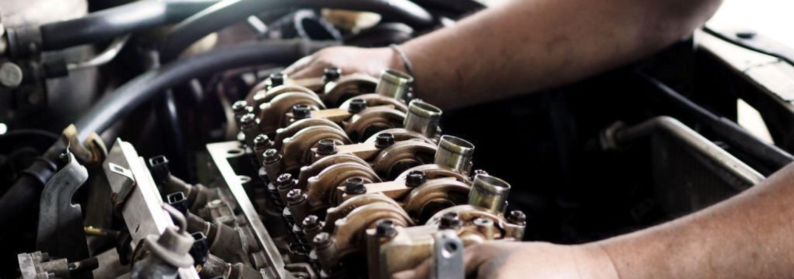Diesel mechanics replacing or repairing defective parts.
